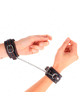 kink - small wrist restraints black with red lining adjustable 14-24 cm x 3.5 cm